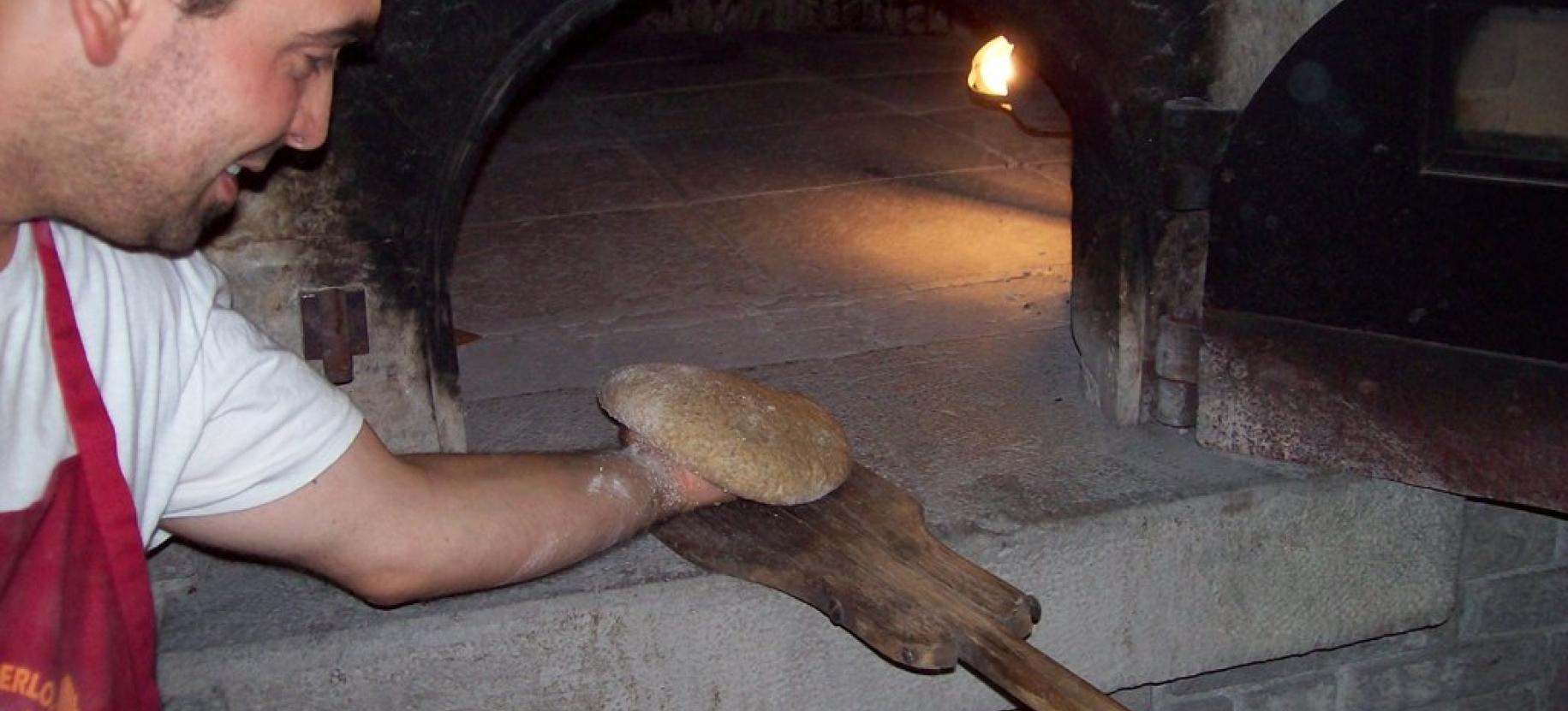 Cooking the bread  Fehta dou pan ner (Rye Bread festival)