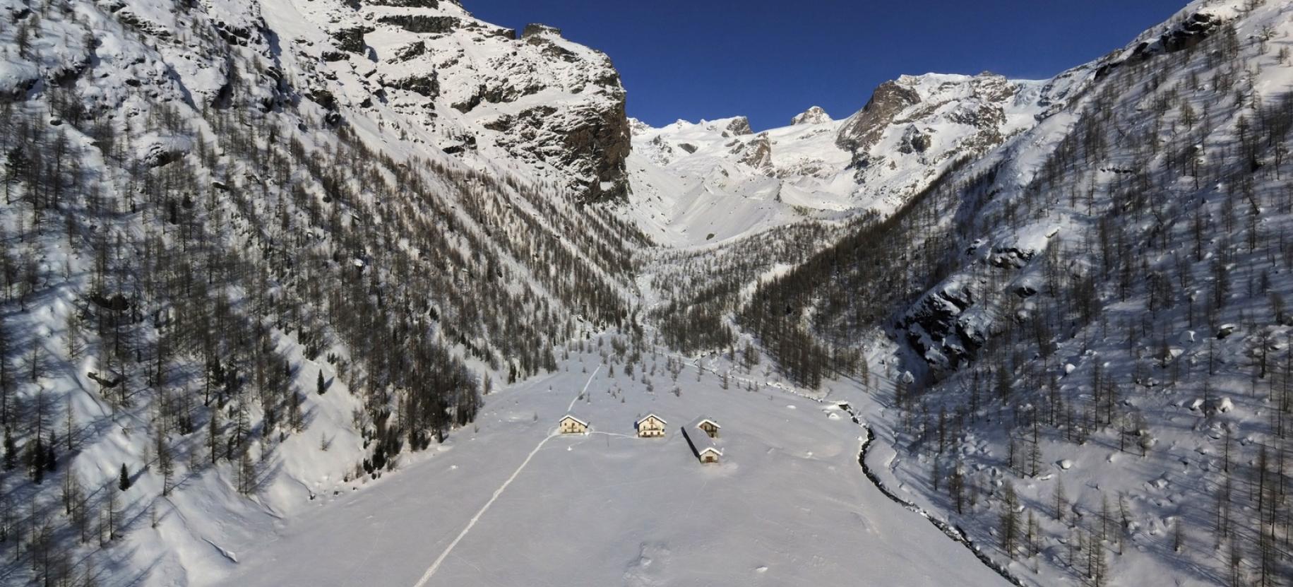 Immagine aerea del Pian di Verra Inferiore rivolta nella direzione della salita 