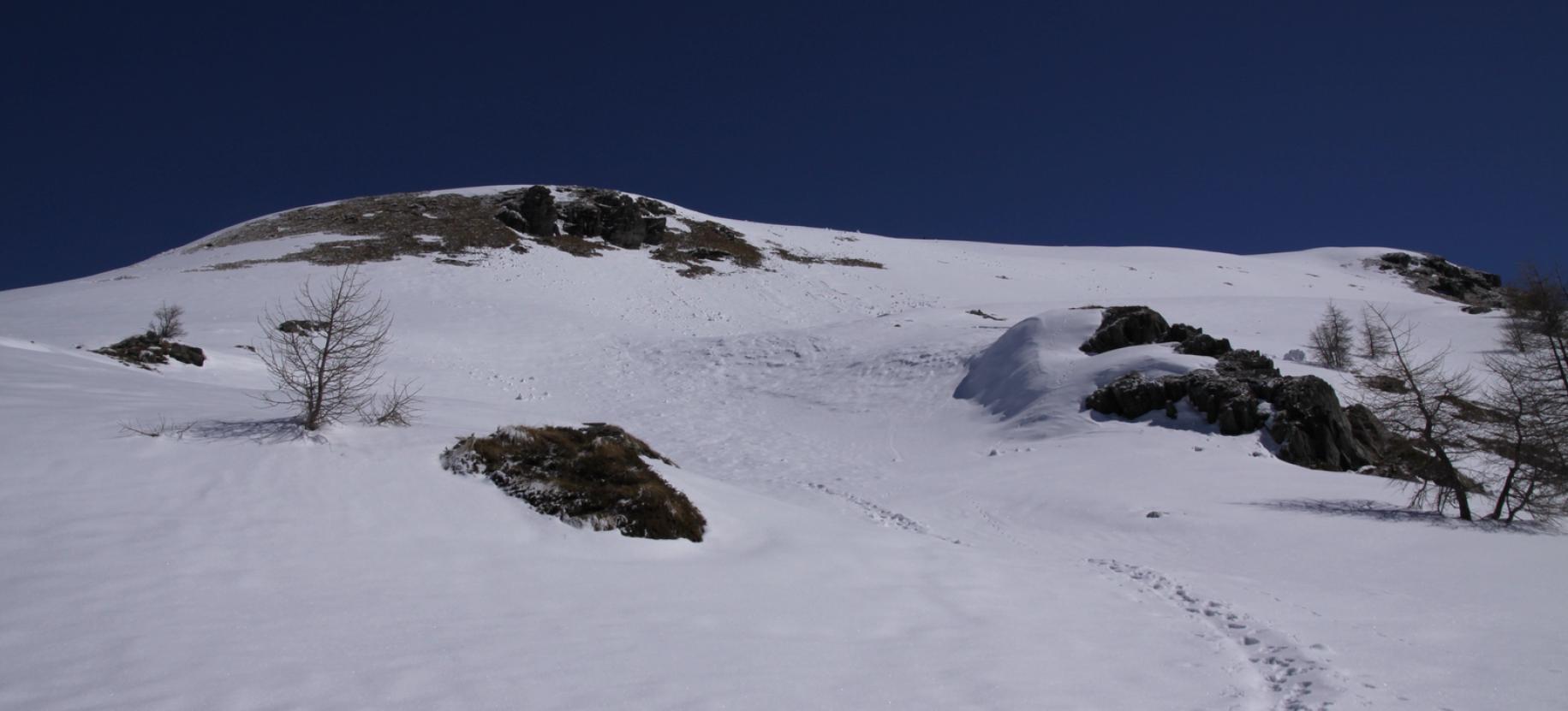 Parte sommitale del Palon di Resy. A seconda delle condizioni, restare sul pendio al centro o spostarsi più a sinistra verso la cresta.